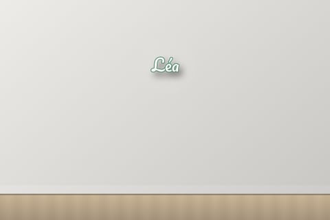 LED letter sign reading Léa on a white wall